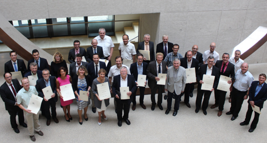 Gruppenbild mit Ministerialdirektor Julian Würtenberger (Foto: Ministerium für Inneres, Digitalisierung und Migration Baden-Württemberg)