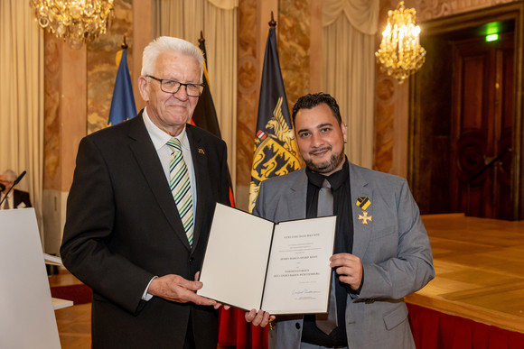 Ministerpräsident Winfried Kretschmann (l.) und Marco-Sharif Khan (r.)