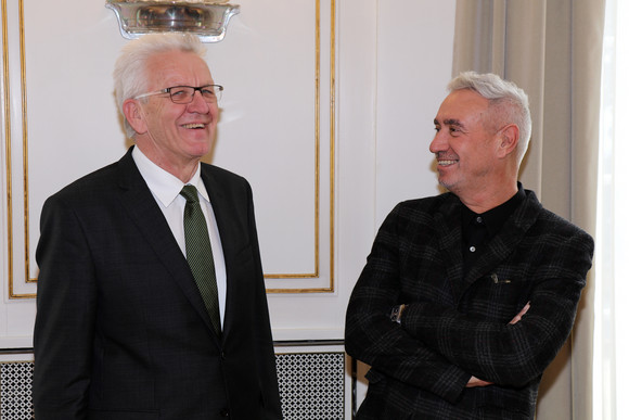 Ministerpräsident Winfried Kretschmann (l.) und Roland Emmerich (r.)