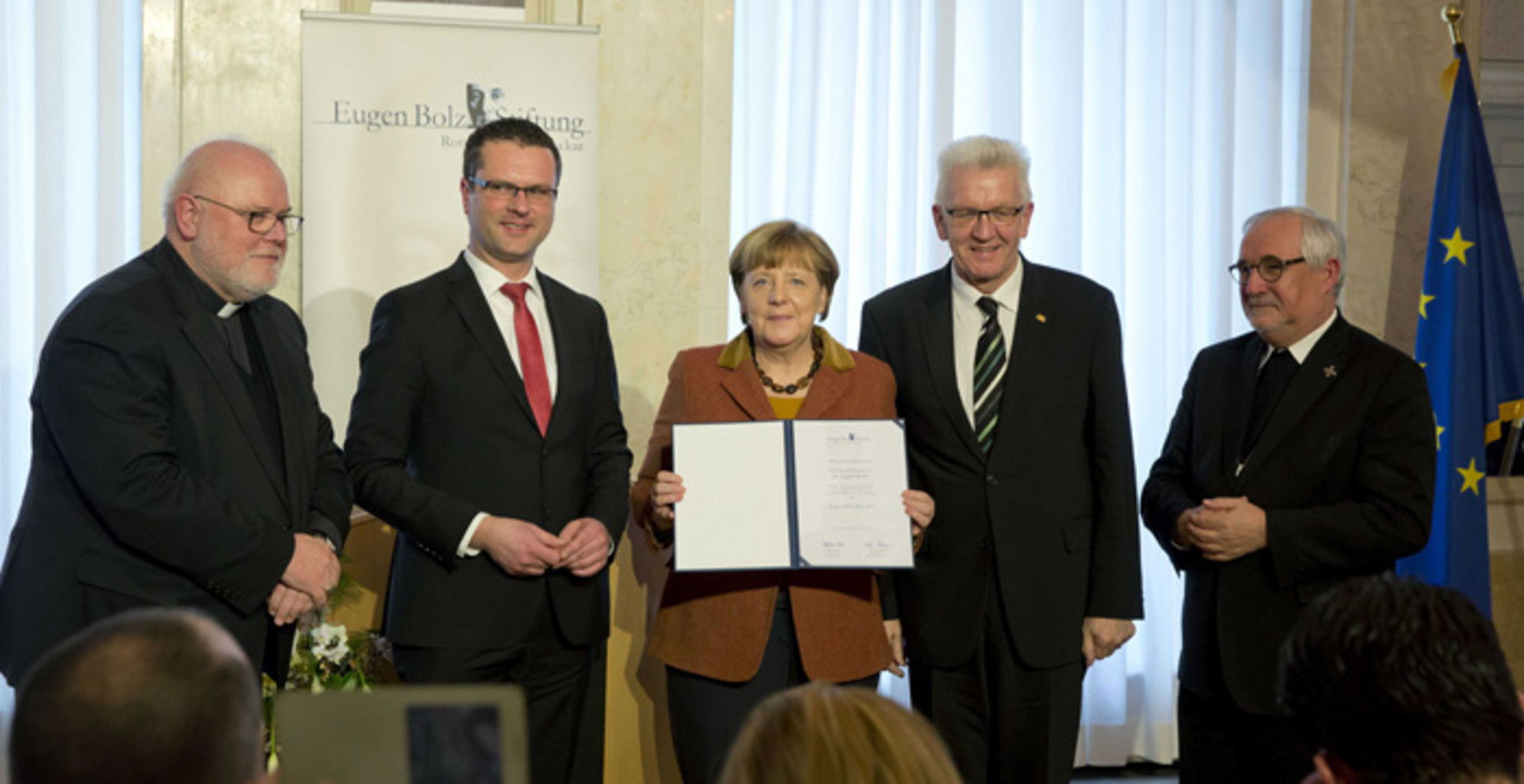 v.l.n.r.: Kardinal Reinhard Marx, Stephan Neher, Oberbürgermeister von Rottenburg, Bundeskanzlerin Angela Merkel, Ministerpräsident Winfried Kretschmann und Gebhardt Fürst, Bischof der Diözese Rottenburg-Stuttgart