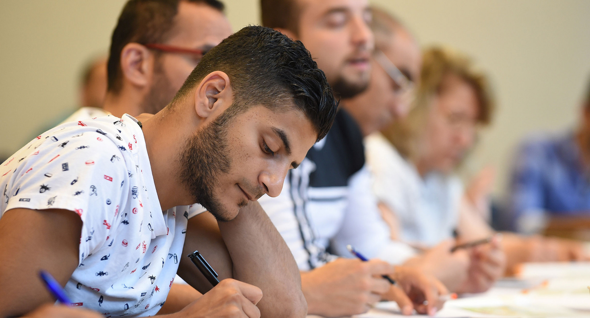 Flüchtlinge in einem Kurs. (Bild: Carmen Jaspersen /dpa)