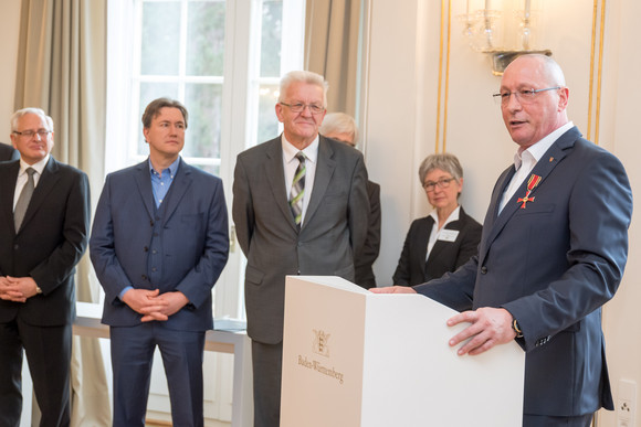 Uwe Hück (r.) und Ministerpräsident Winfrried Kretschmann (M.)